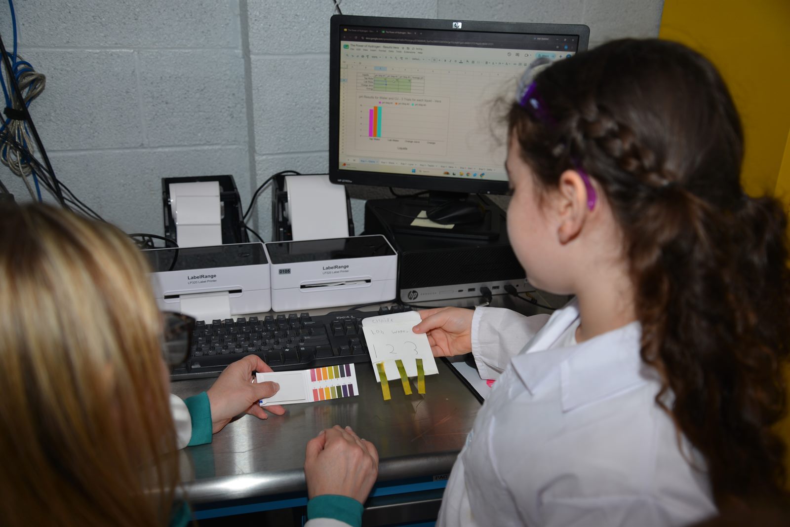 MiLab students analyzing pH test strip results