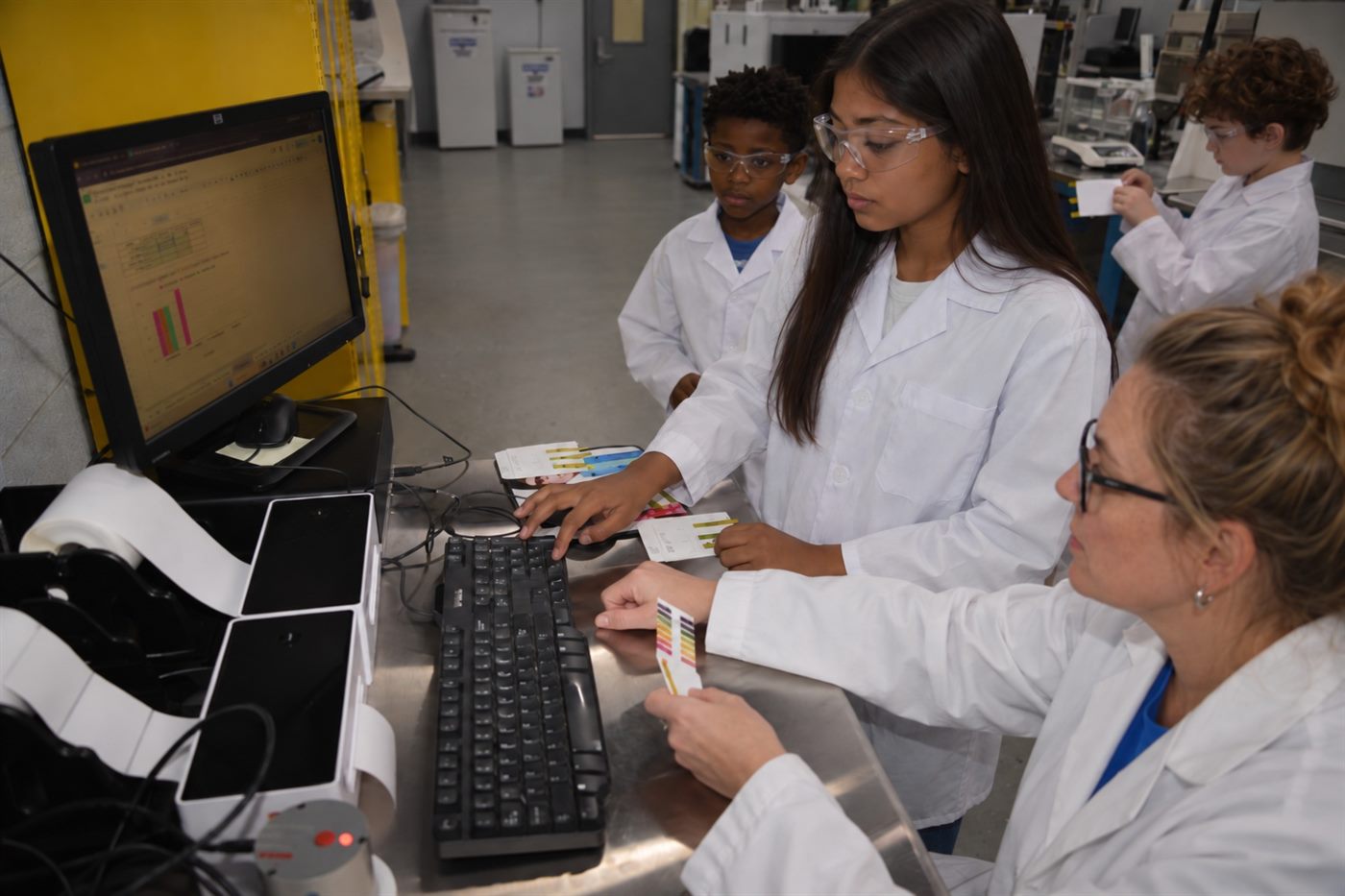 MiLab students analyzing pH test strip results
