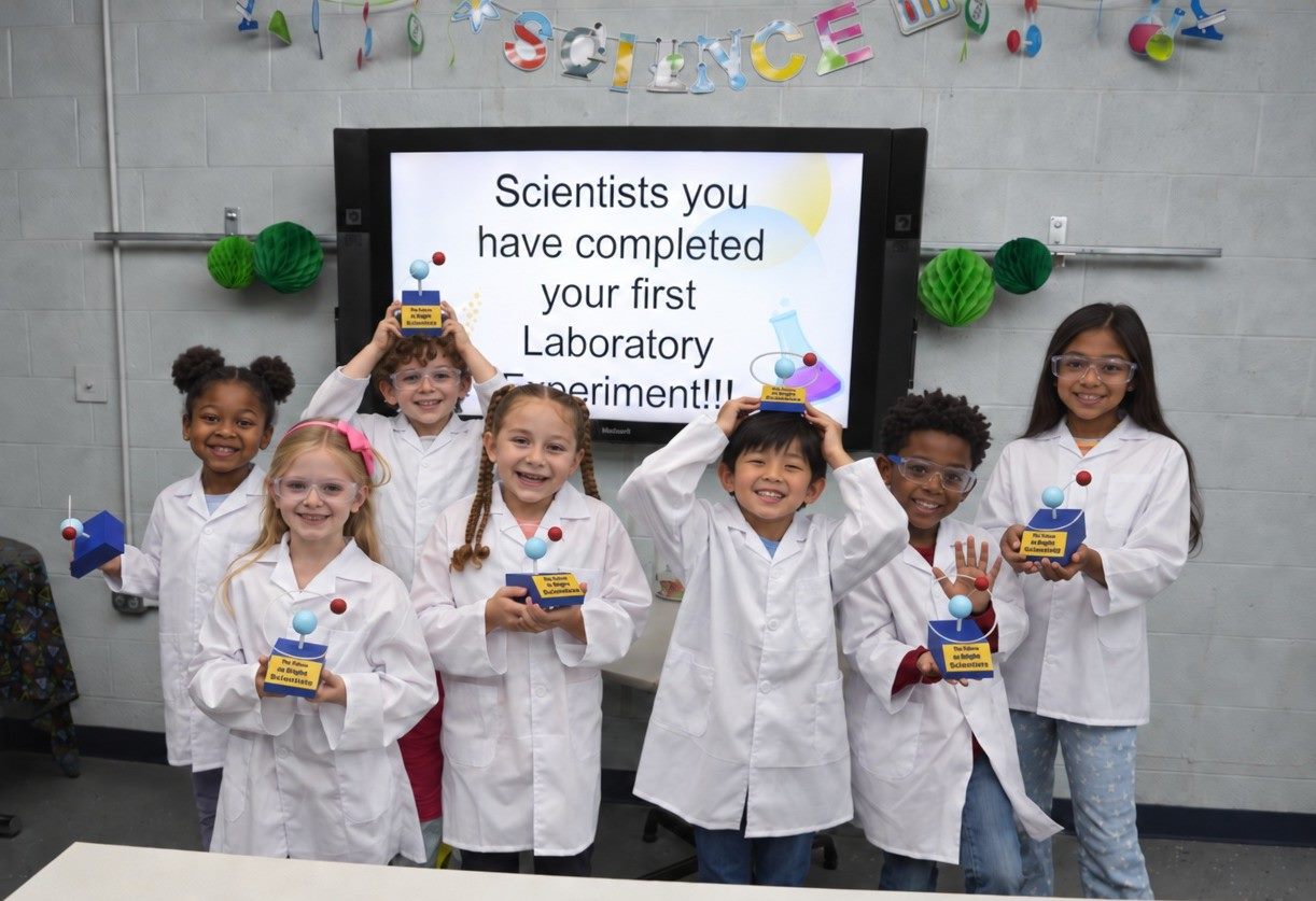 MiLab students touring the lab in their lab coats